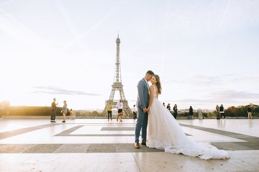 happy-romantic-married-couple-hugging-near-eiffel-